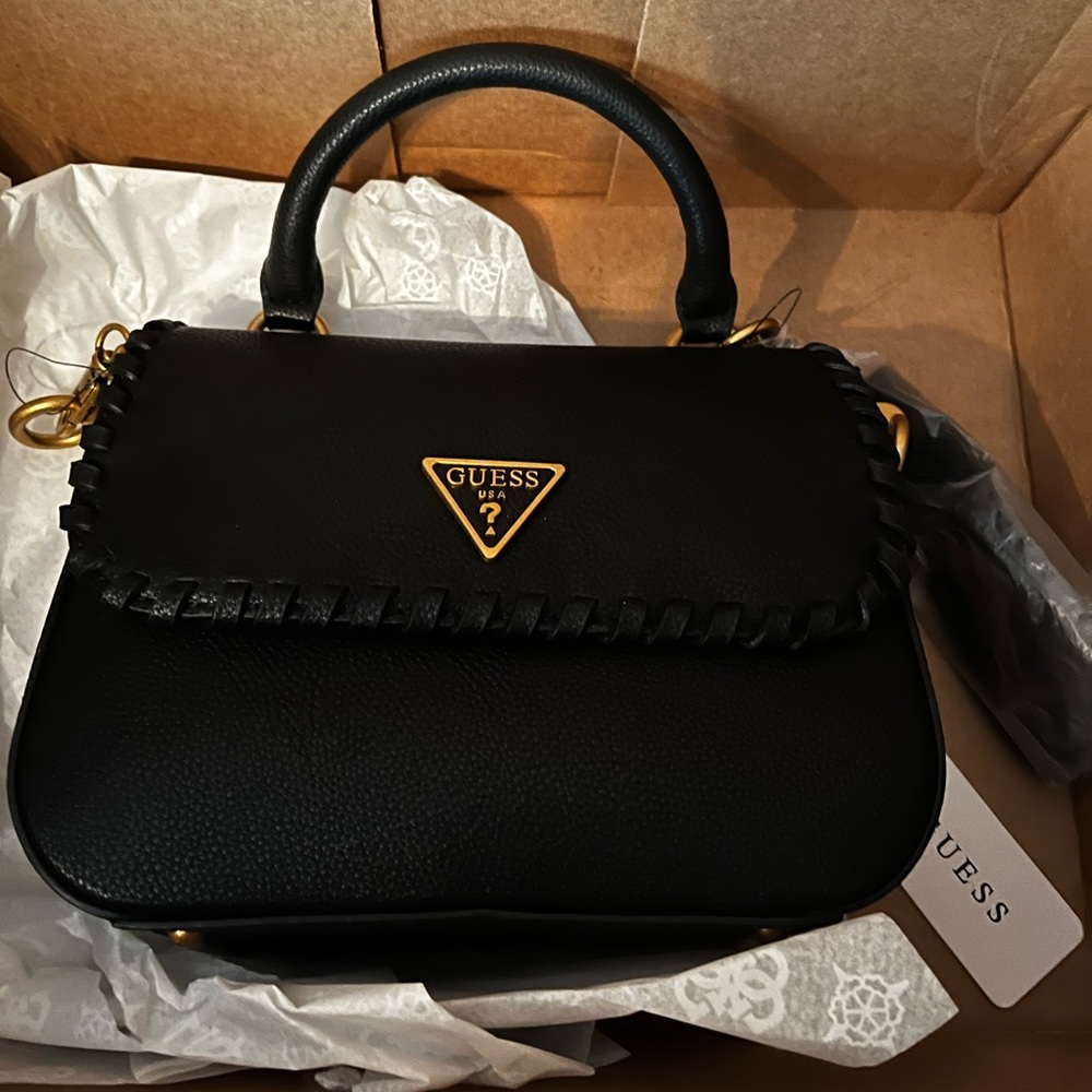 Brand new guess black cross body purse.